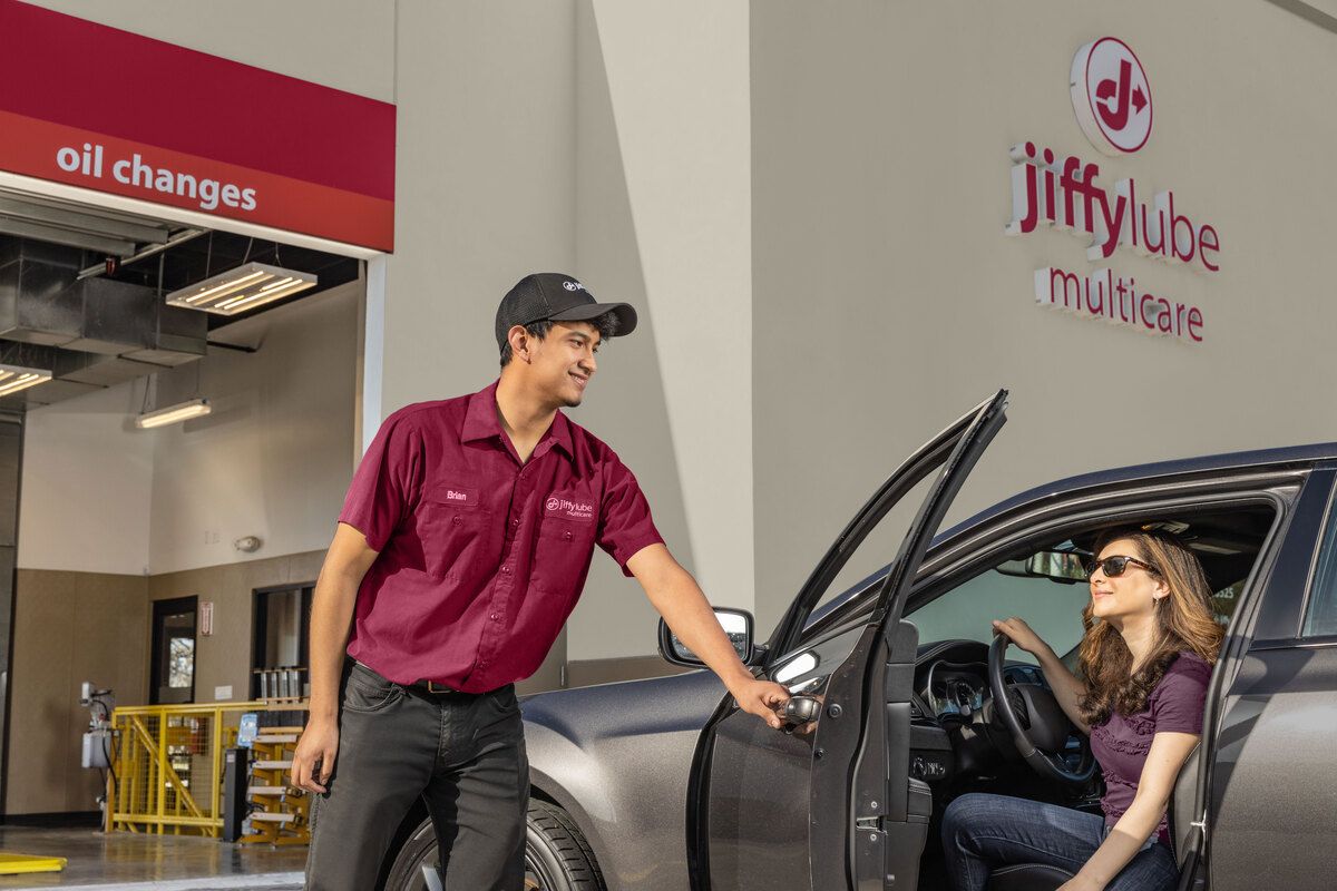 Service advisor consulting with customer